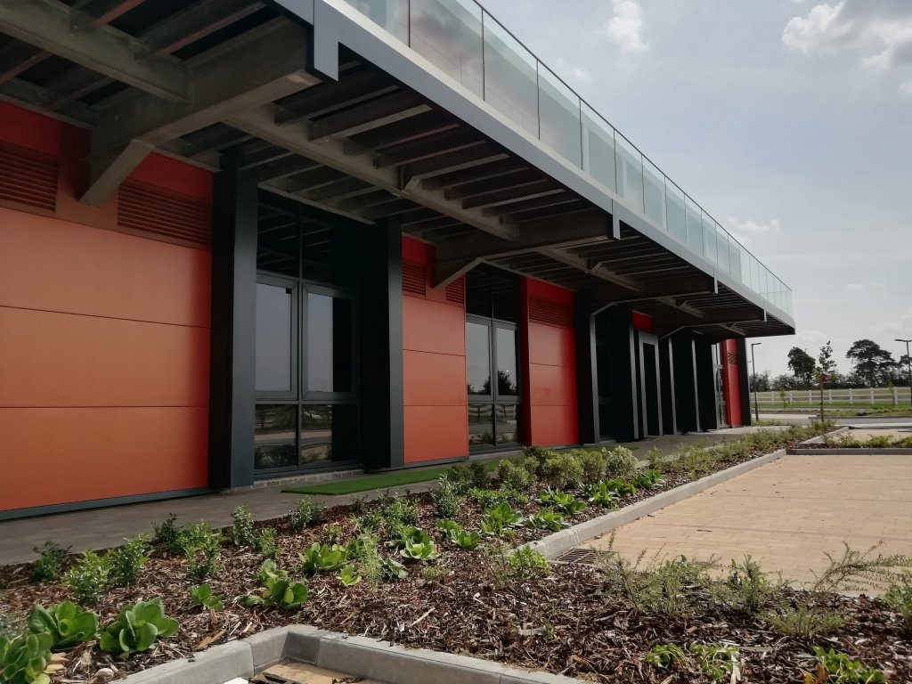 Dick White Referrals Veterinary Centre - external shot of building and car park